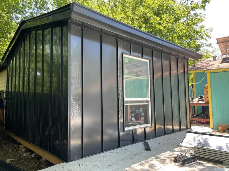 Black standing seam metal wall panels for Metal Roof Installation in Mundy