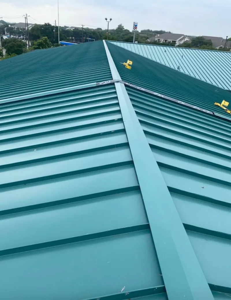 Green commercial metal roof ridge and valley for Metal Roof Repair in Mundy